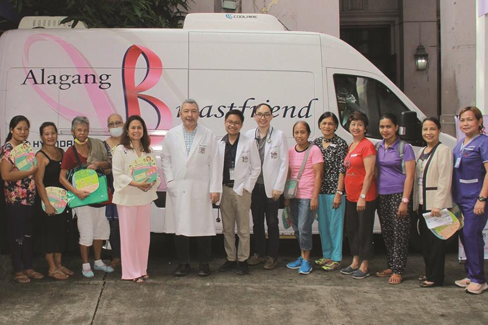 Fig. 1 Dr. Jorge Ignacio (Director, UP-PGH CI), with Medical Oncology Fellows Dr. Lance Catedral and Dr. Alfredo Chua, Jr. (Center) together with stakeholders of the UP-PGH Mobile Breast Cancer Diagnostic Clinic Program.